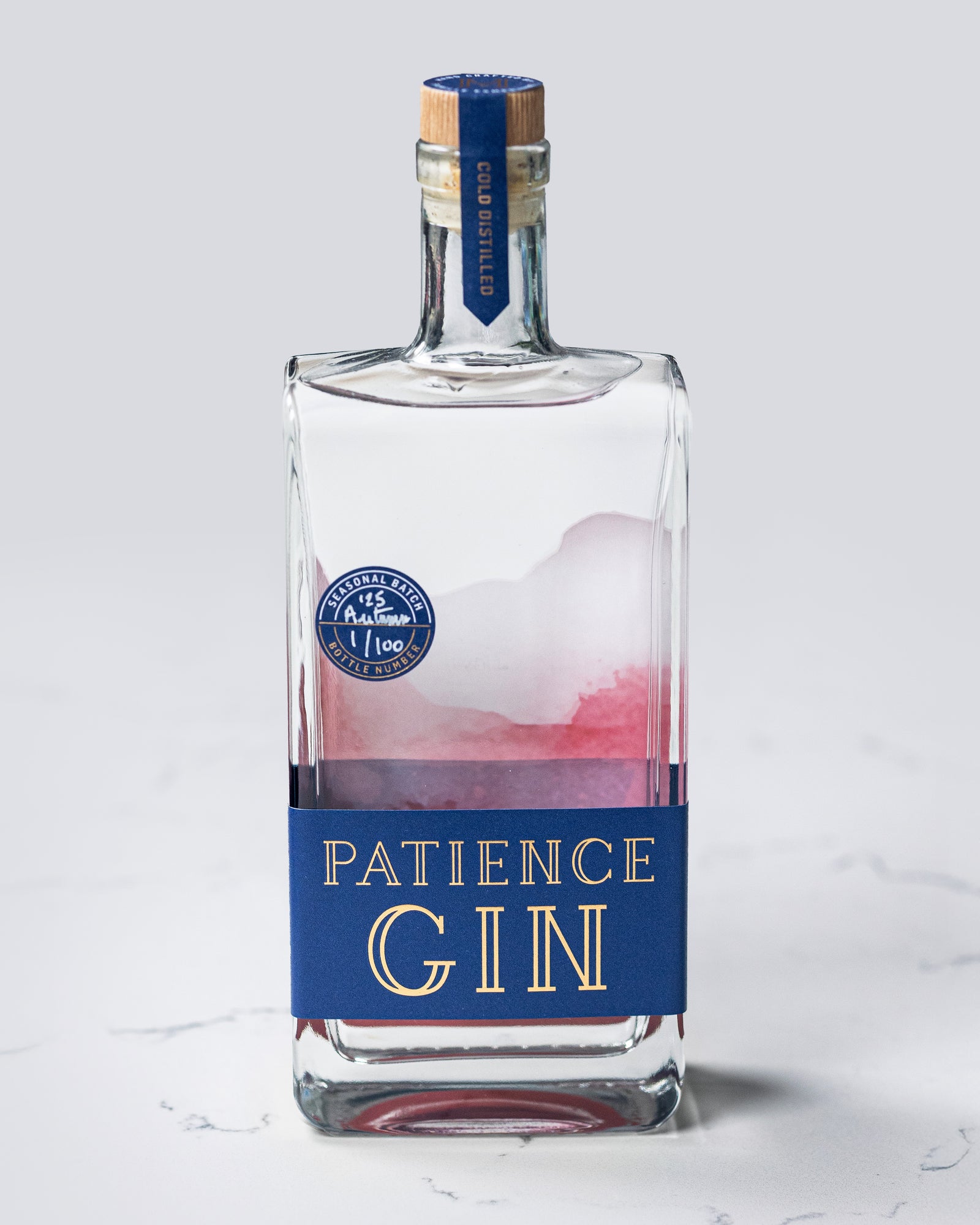 Bottle of Patience Autumn Gin on a white background